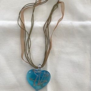Glass blown pendant with leather and lace multi strand necklace